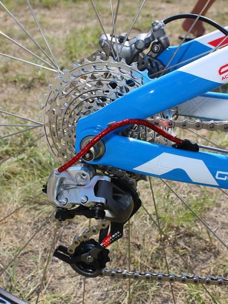 A standard SRAM XX rear derailleur is bolted to the replaceable hanger.