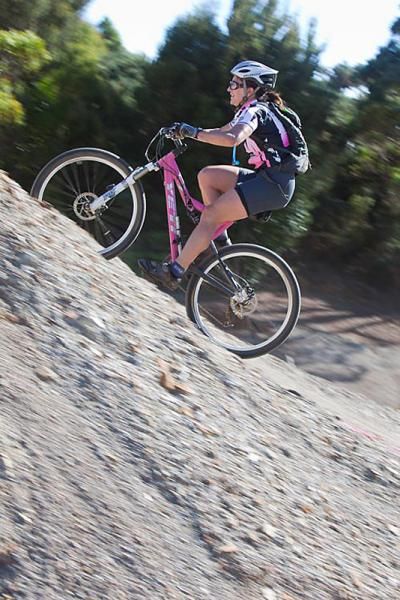 A rider powers up a climb.
