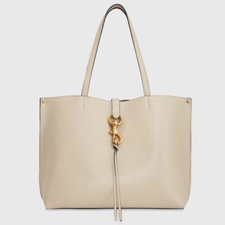 cream tote with tassel and clip front