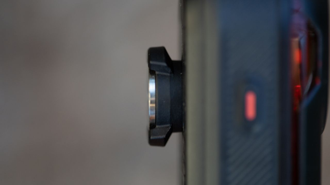 Garmin Varia RCT715 side view of mounting tabs