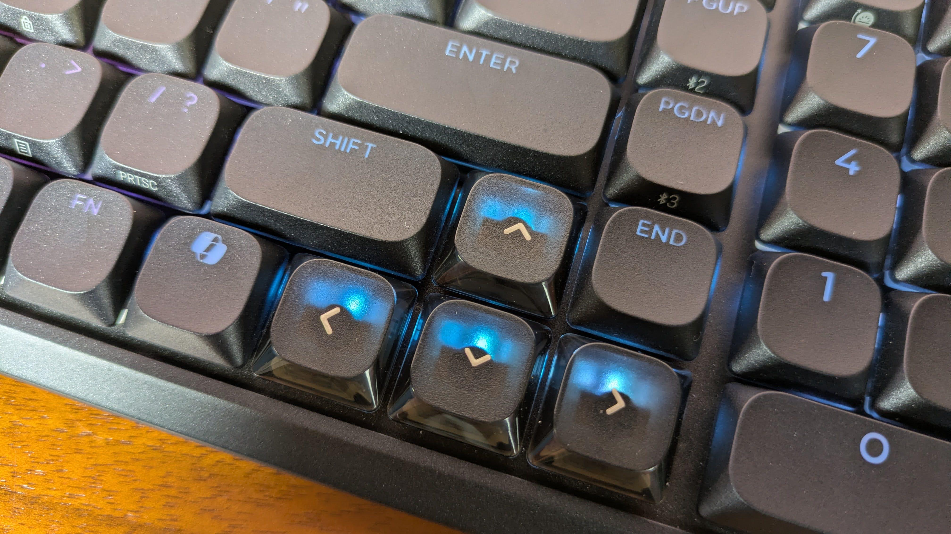 Close-up of arrow keys on Corsair Vanguard Air 99 Wireless