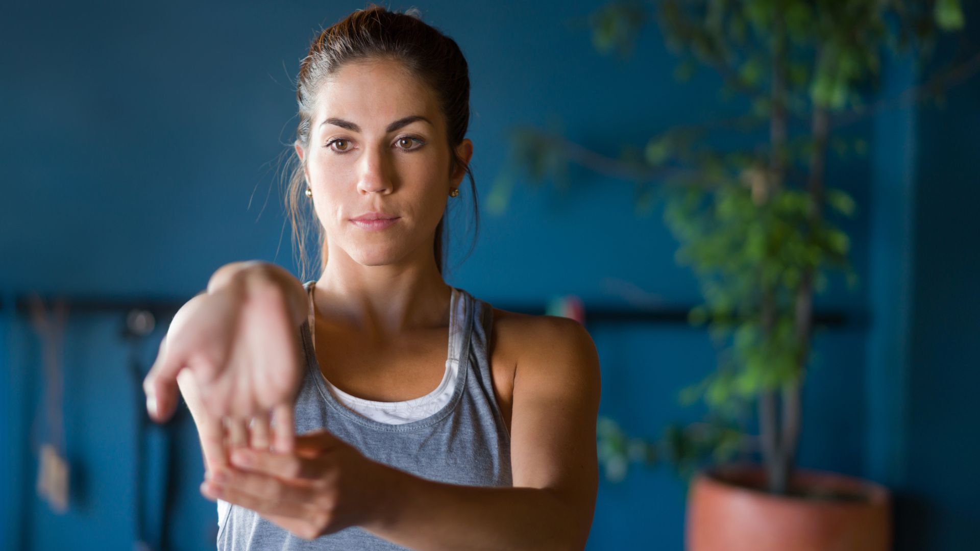 woman doing wrist exercise