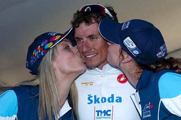 Italian star Filippo Pozzato receives congratulatory kisses on the podium in Buninyong.