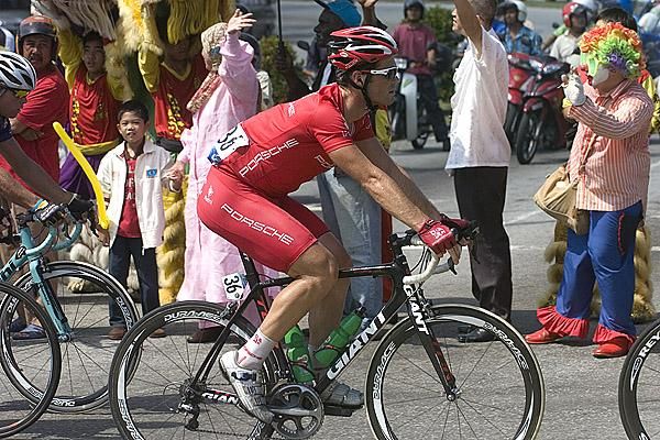 Rhys Pollock (Drapac Porsche) wasn't in the mood for clowning around with the Genting Highlands up-ahead - but someone else was.