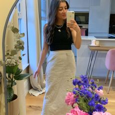 Fashion Editor Zoe Anastasiou wears Midi skirt and top outfit formula