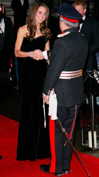 Catherine, Princess of Wales greets Sir David Brewer, Lord-Lieutenant of Greater London, as she attends The Sun Military Awards in 2011