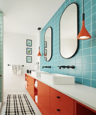 narrow bathroom ideas, turquoise and red bathroom with twin basins, mirrors and taps, artwork, rug