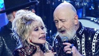 Dolly Parton and Rob Halford singing together