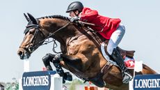 Longines FEI Nations Cup&trade; Jumping Samorin SVK. Martin Fuchs SUI riding Chaplin. Photo FEI/Łukasz Kowalski