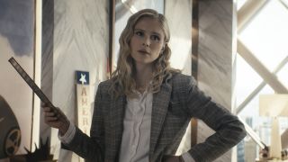 Annie / Starlight wearing patterned gray jacket with one hand on her hip in The Boys Season 4