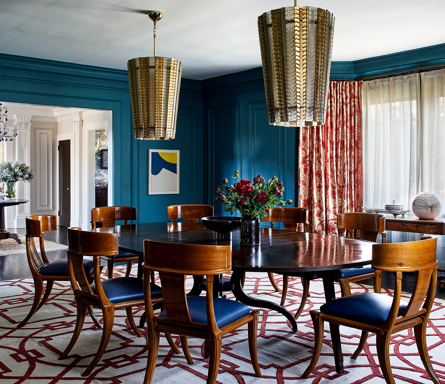 dining room with burnt red and blue color palette