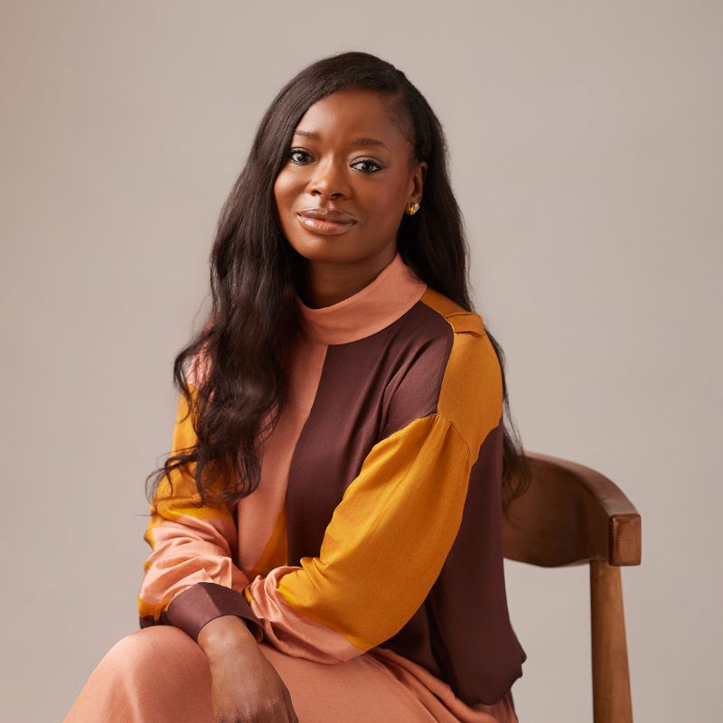 headshot of Tola Ojuolape