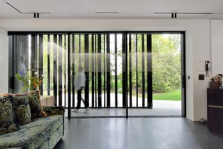 View from inside to outdoors through glazing and slatted screen at Wood Art Pavilion by Labscape