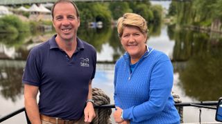 Clare Balding with the captain of a pleasure boat on the Severn.