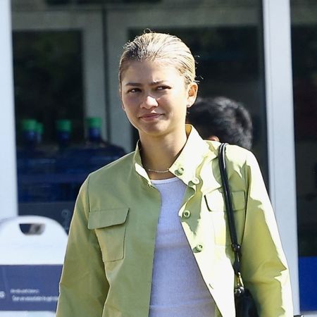 Zendaya wearing a lime green jacket