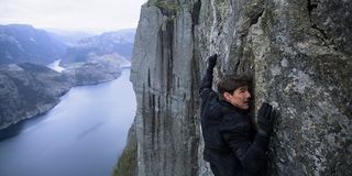Ethan Hunt hanging on to a cliff in Mission: Impossible Fallout