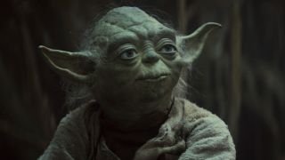 Yoda stands stoically in the Dagobah swamps in Star Wars: The Empire Strikes Back.