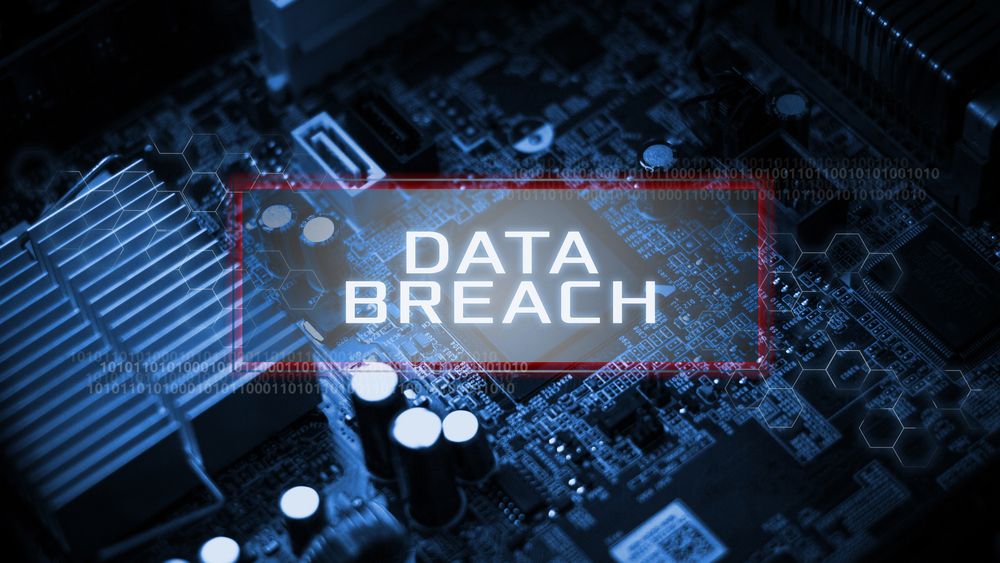 Data Breach overlaying a circuitboard