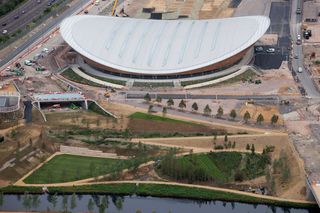 London 2012 Aquatics Centre by Zaha Hadid: The Velodrome with the landscaped parklands in the foreground
