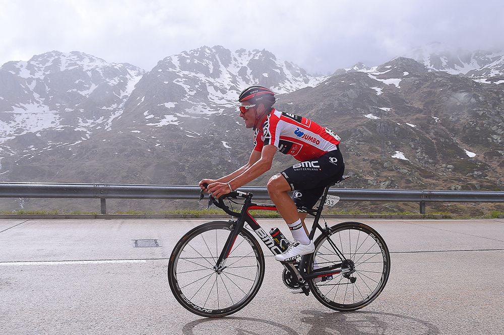 Mountains set the back drop as Silvan Dillier rides during stage 5 at Tour de Suisse