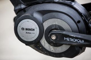 A Bosch ActiveLine motor placed around the bottom bracket of an e-bike