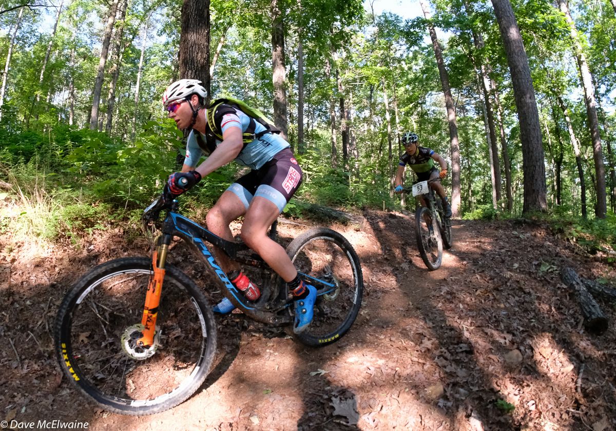 Rose Grant (Stans NoTubes-Pivot) leading Crystal Anthony (Riverside Racing) halfway through lap one