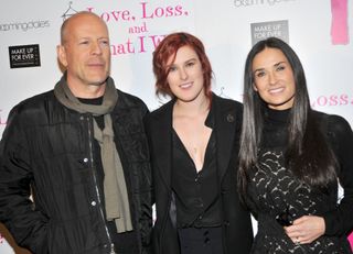 (L-R) Bruce Willis, daughter Rumer Willis and Demi Moore pose at the "Love, Loss & What I Wore" new cast member celebration at B Smith's Restaurant on March 24, 2011 in New York City.(Photo by Bruce Glikas/FilmMagic)