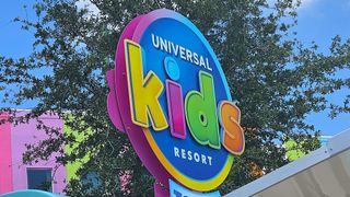 The Universal Kids Resort logo is shown on a sign in the park.