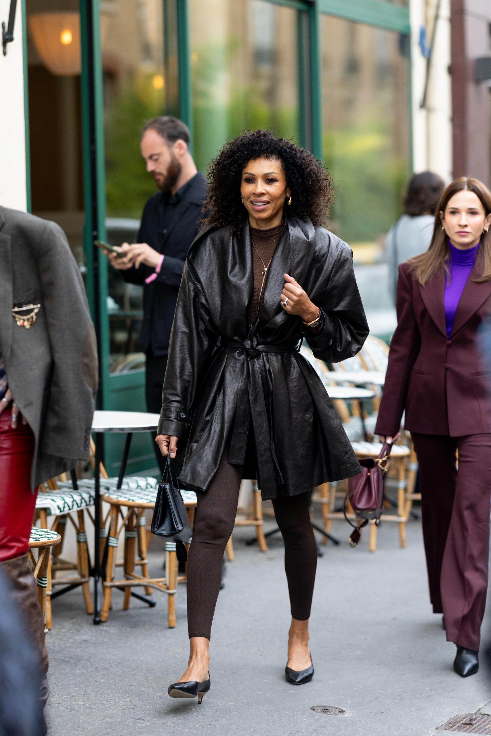 French girls wearing trench coats for fall at Paris Fashion Week