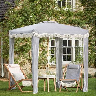 pop up canopy with garden and folding chair