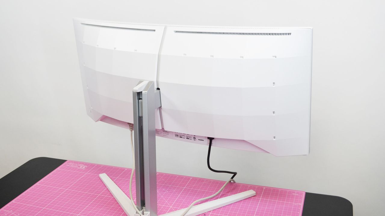 The philips evnia 34m2c8600 on a desk