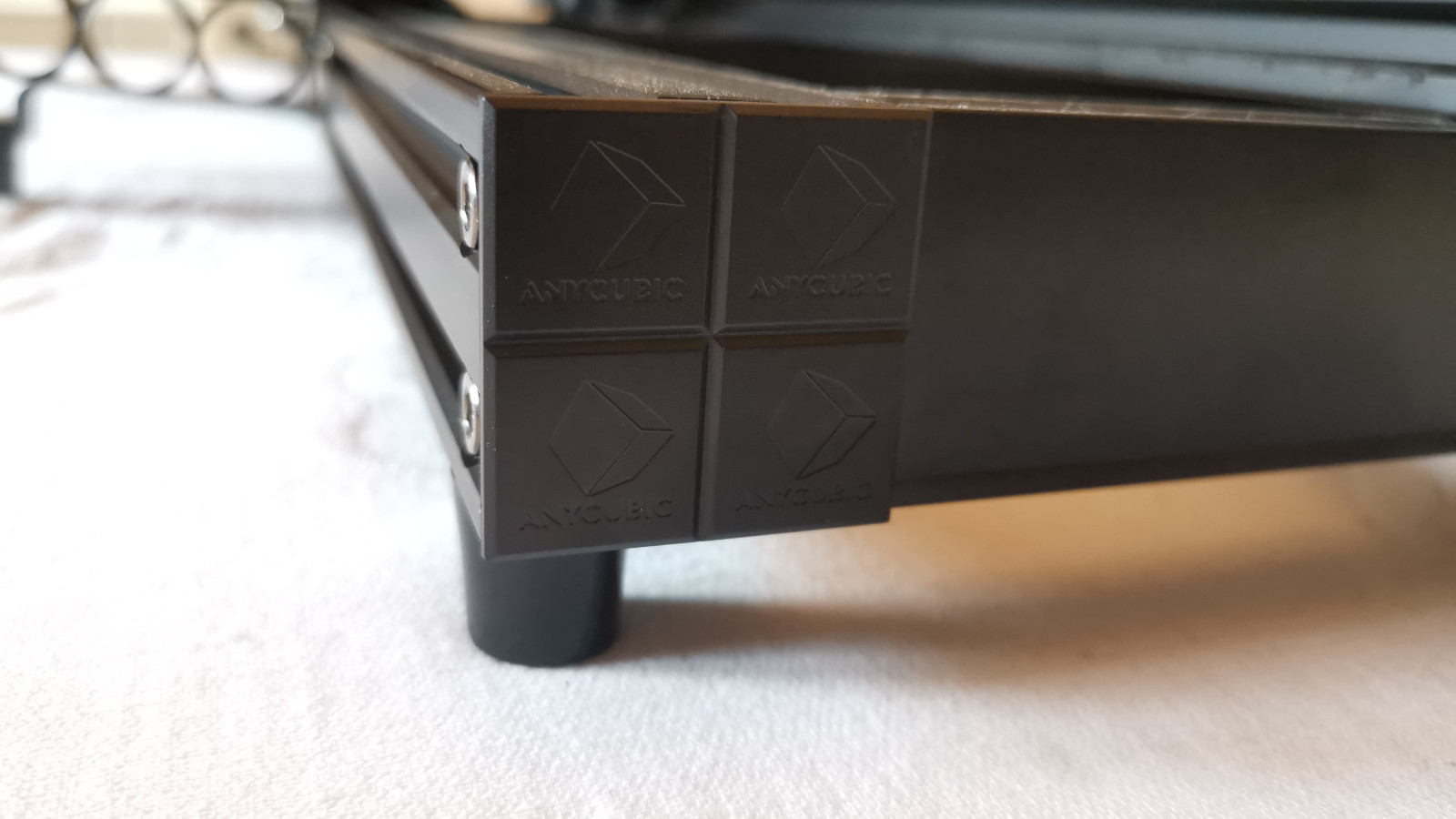 A branded end cover on the Anycubic Kobra Max 3D printer