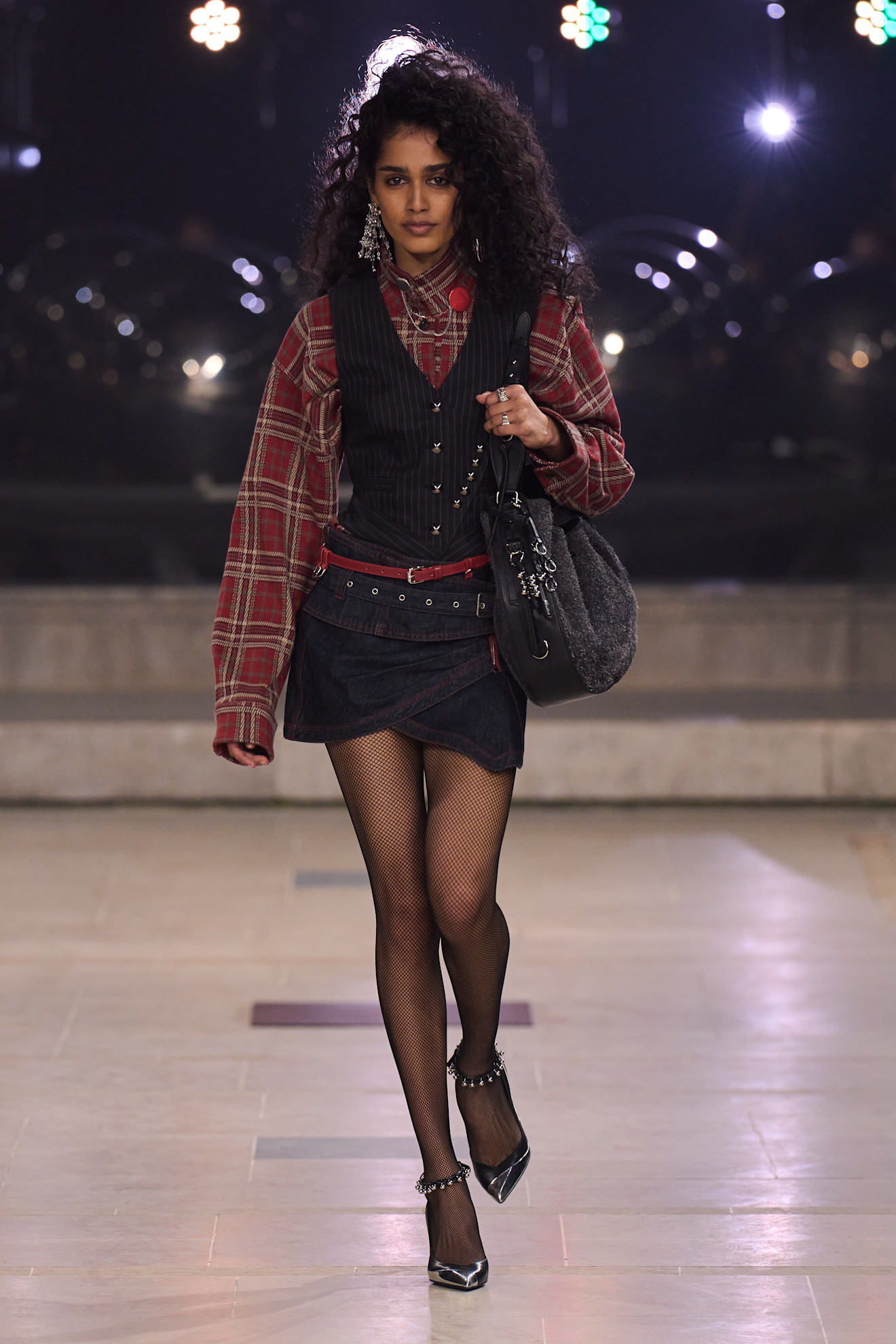 Isabel Marant runway show model in denim mini skirt