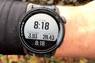 Coros Pace 3 smartwatch in use on a male cyclist's wrist
