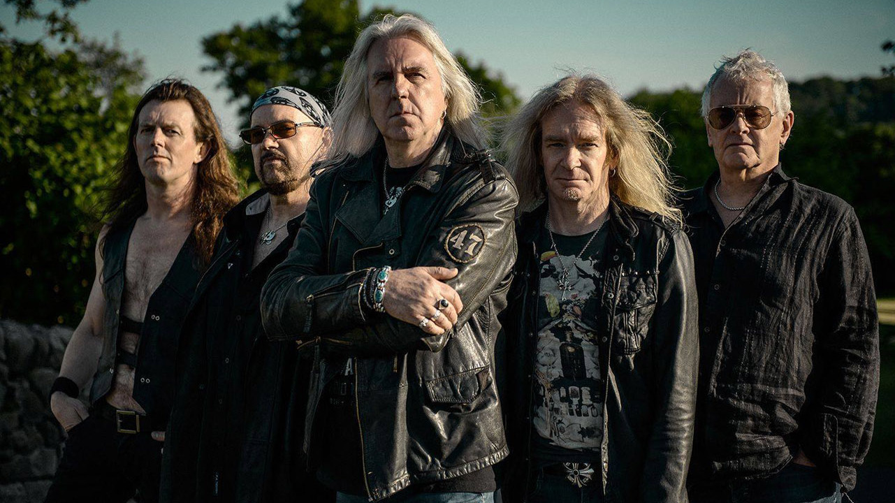 A picture of Nigel Glockler with Saxon