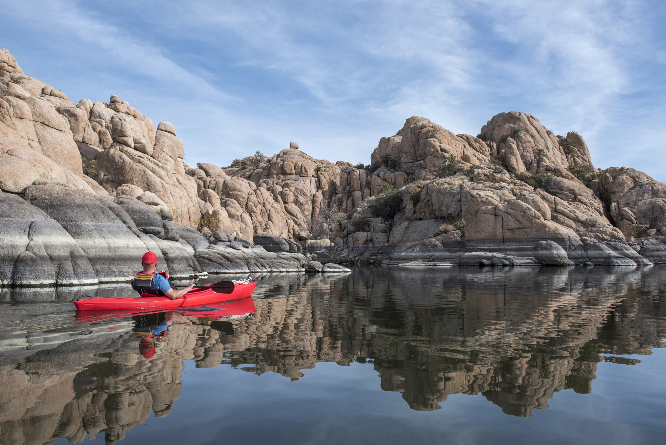Active senior kayaking on Watson Lake, Arizona