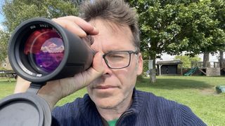 Python Rangemaster monocular being used by the reviewer.