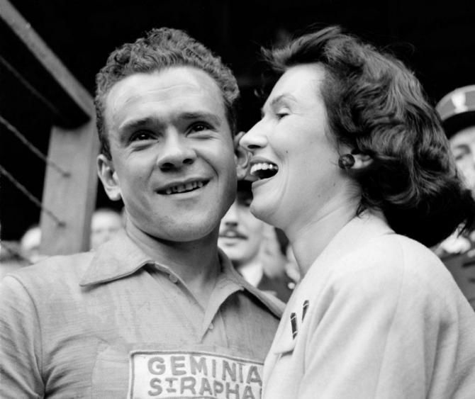 Frenchman Roger Walkowiak smiles after completing the 22nd and last stage of the Tour de France, between Montlu&ccedil;on and Paris, 28 July 1956. Walkowiak won the Tour de France in front of his compatriot Gilbert Bauvin, without achieving a single stage victory. AFP PHOTO
