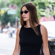 Hailey Bieber wearing a black tank top in NYC