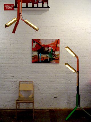 Studio room with lights, wall art & chair