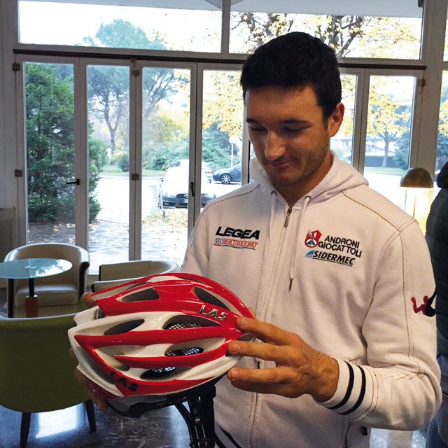 Riders check out a new helmet