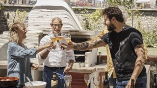 Stanley Tucci makes a toast in Stanley Tucci: Searching for Italy
