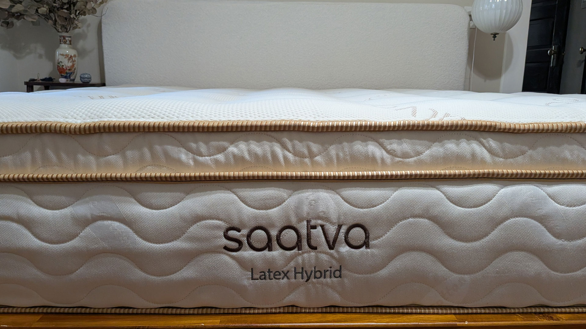 Close up of the edge of the Saatva Latex Hybrid mattress