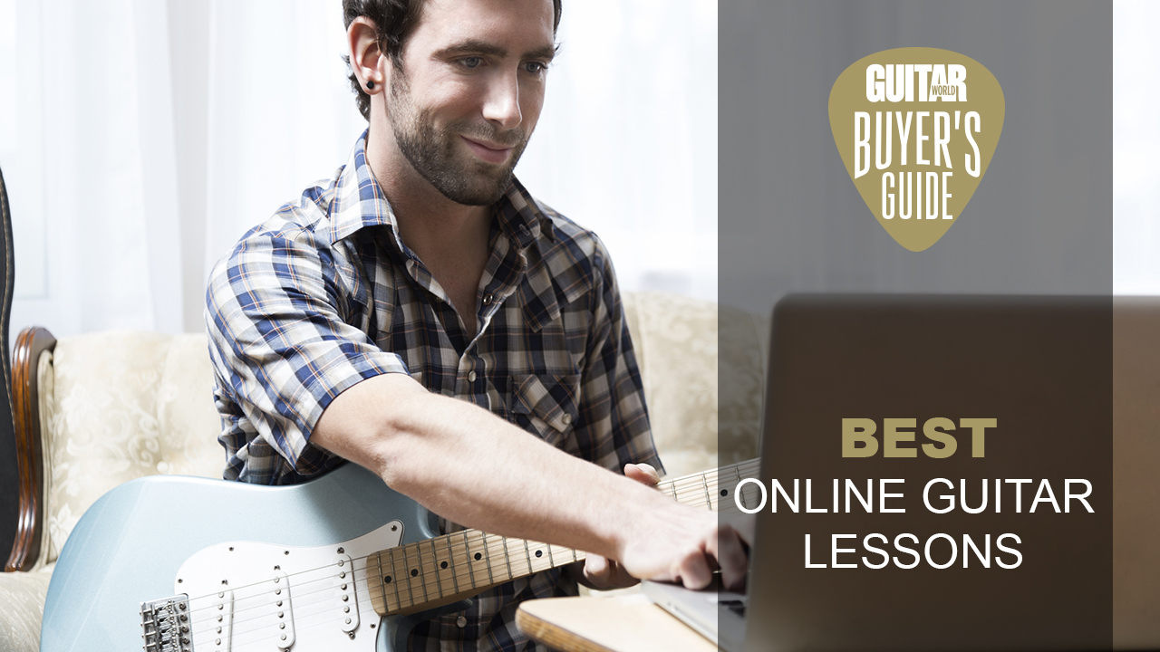 Man with holding blue electric guitar types on his laptop