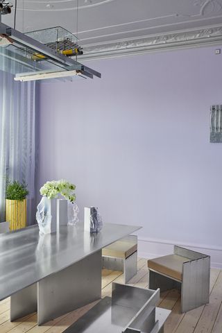 Lilac dining room interiors with aluminium furniture