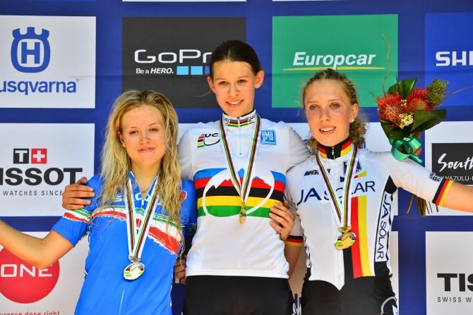 Italy's Emilie Collomb (left), Switzerland's Alessandra Keller (centre) and Germany's Sarah Bauer (right) claimed second, first and third respectively in the Junior Women's Cross Country