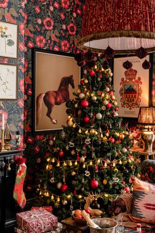 Christmas living room with maximalist modern take on traditional colours by Mindthegap
