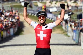 Nino Schurter of Switzerland won the Mountain Bike Cross-country world title for the 10th time in 2022