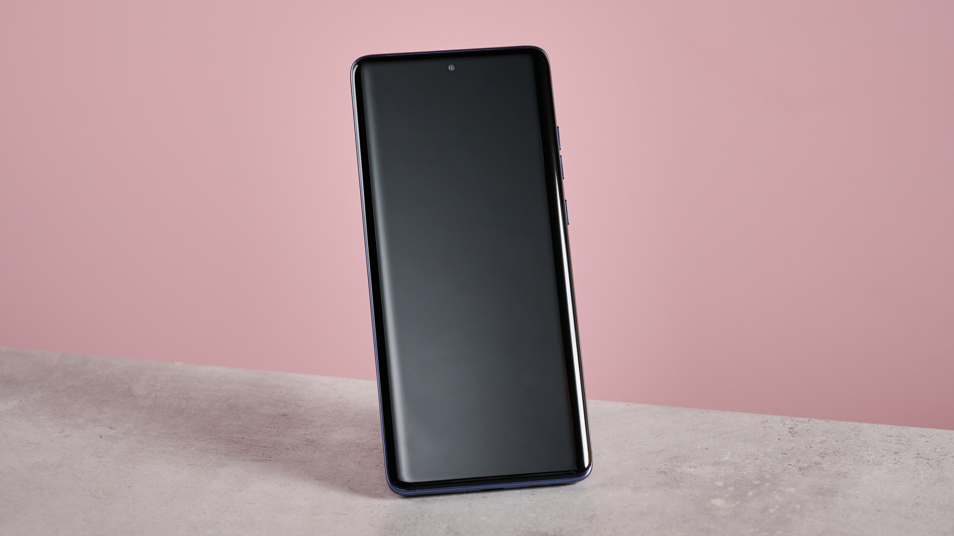 Motorola Edge 60 Fusion with display off against pink background