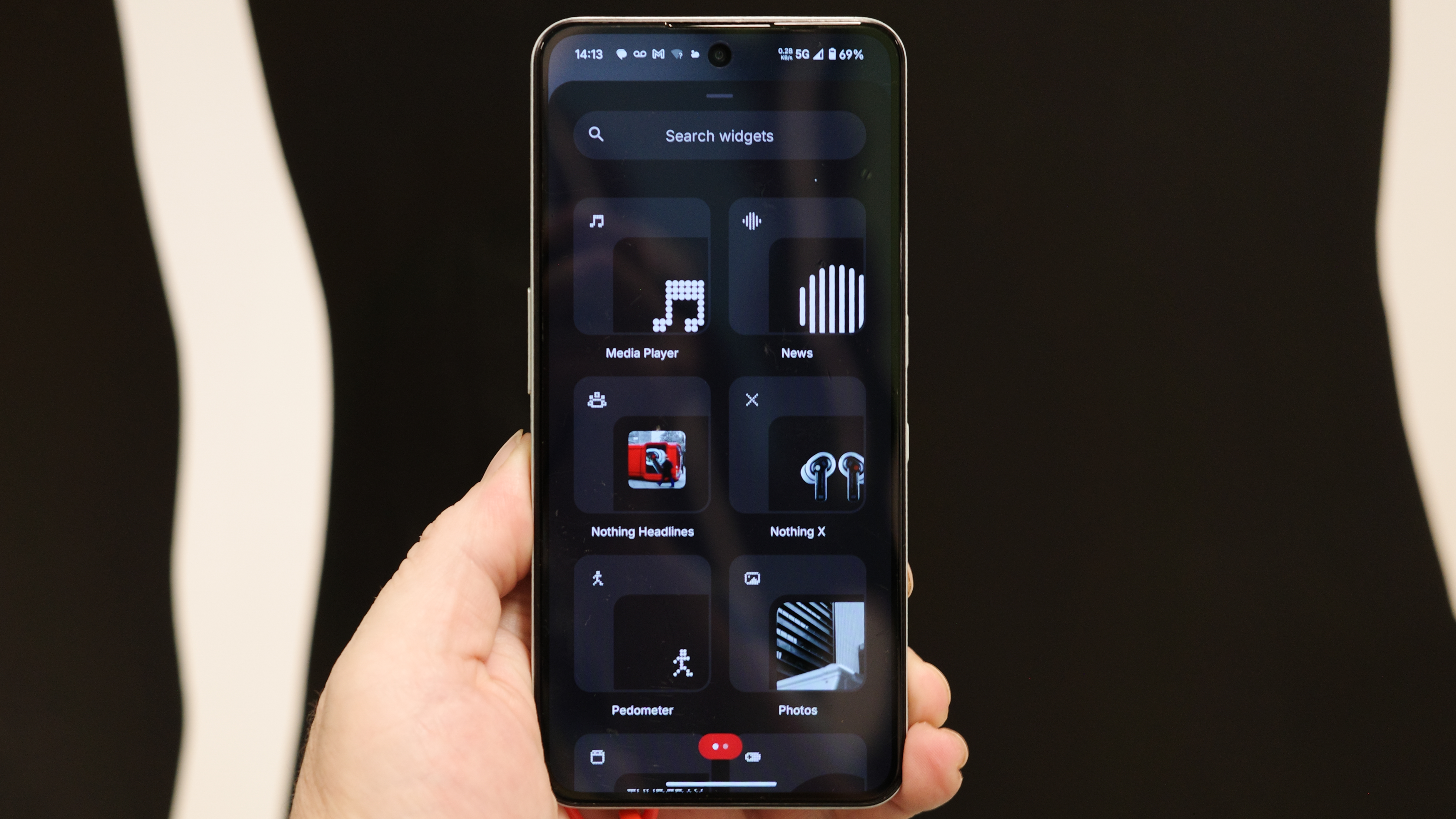 CMF Phone 2 Pro with widgets displayed on the screen